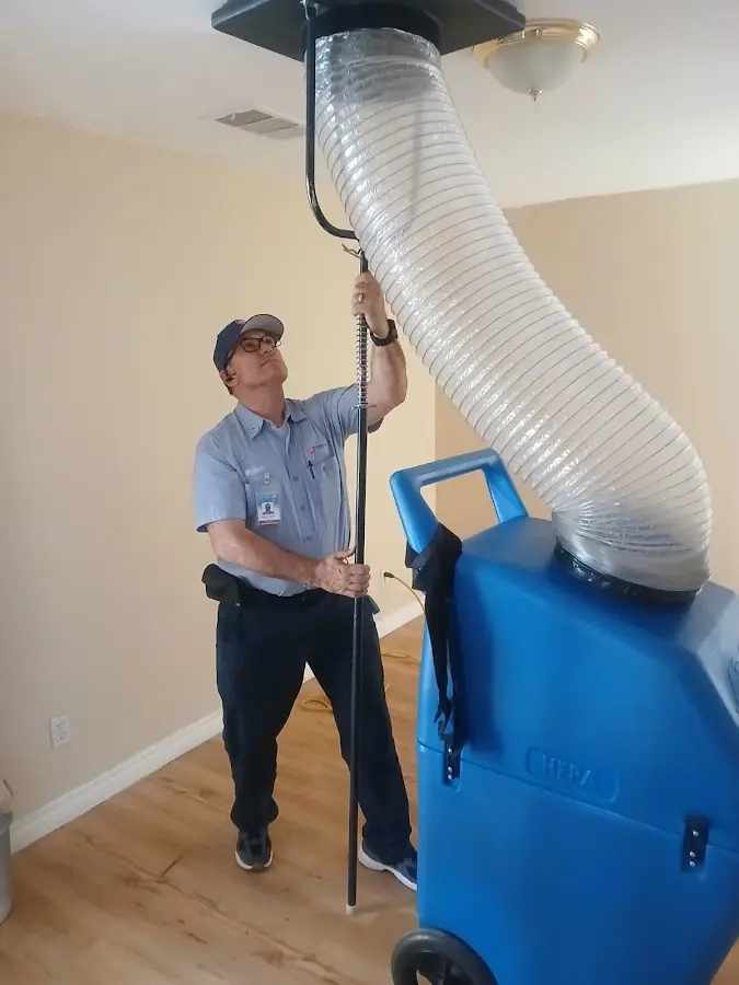 Mini Split Installation technician using HEPA equipment in Muskego